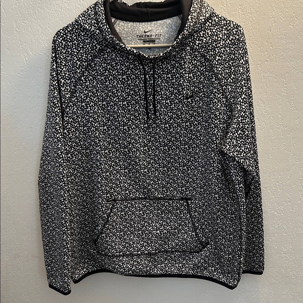 40. Nike Therma-Fit Women’s Black and White Printed Pullover Sweater